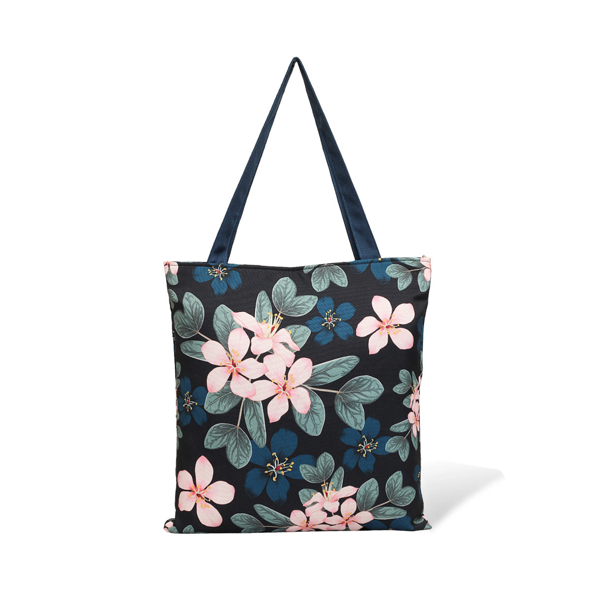 A black tote bag with pink floral print and navy blue handles on a white background.