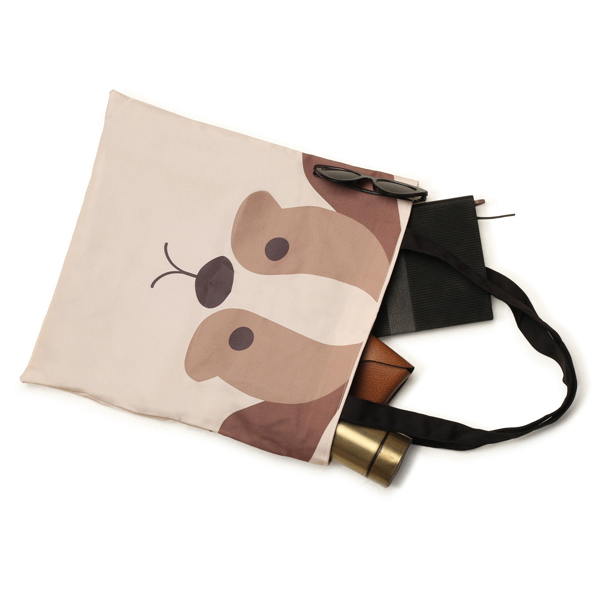 Fashionable tote bag with a whimsical dog face design, a playful addition to any outfit.