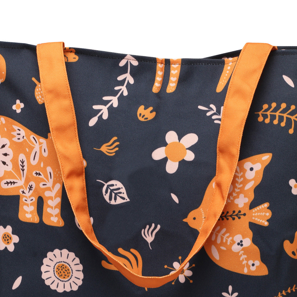 Zoom view of A black tote bag with orange and white animal and plant print designs, featuring deer, fish, and flowers, with orange handles.