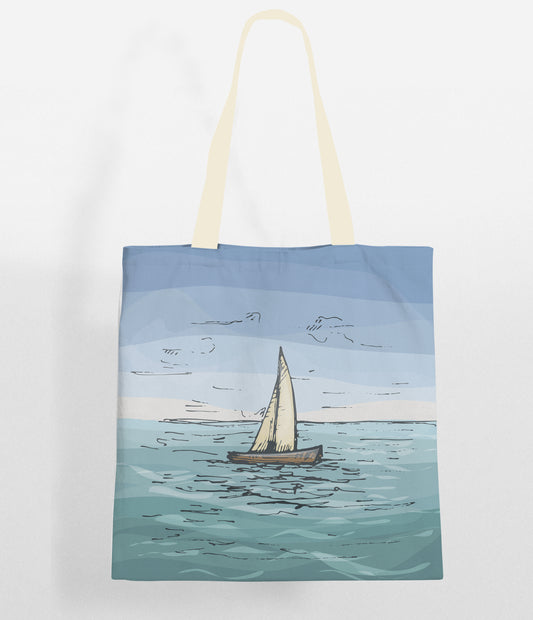 A tote bag featuring a sailboat sailing on the ocean, perfect for carrying essentials to the beach or on a nautical adventure.