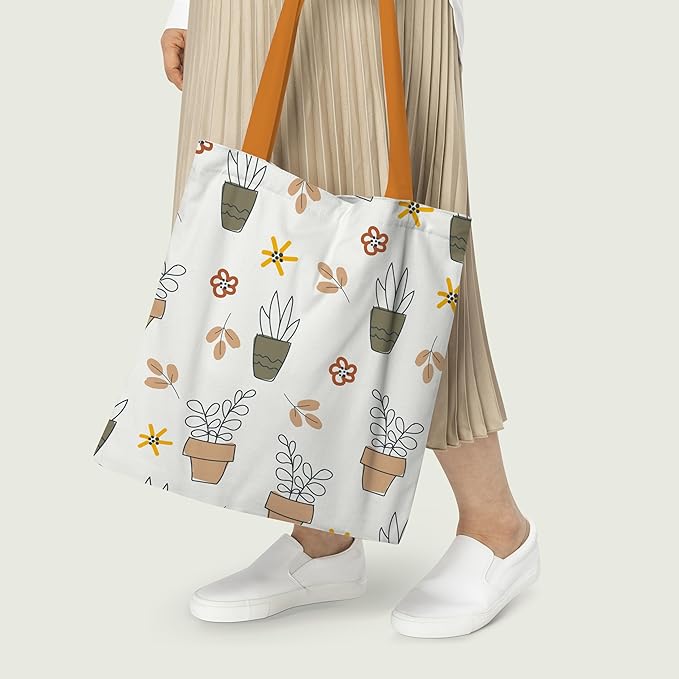 A beautifully designed tote bag featuring an array of colorful flowers and lush plants, ideal for nature enthusiasts.
