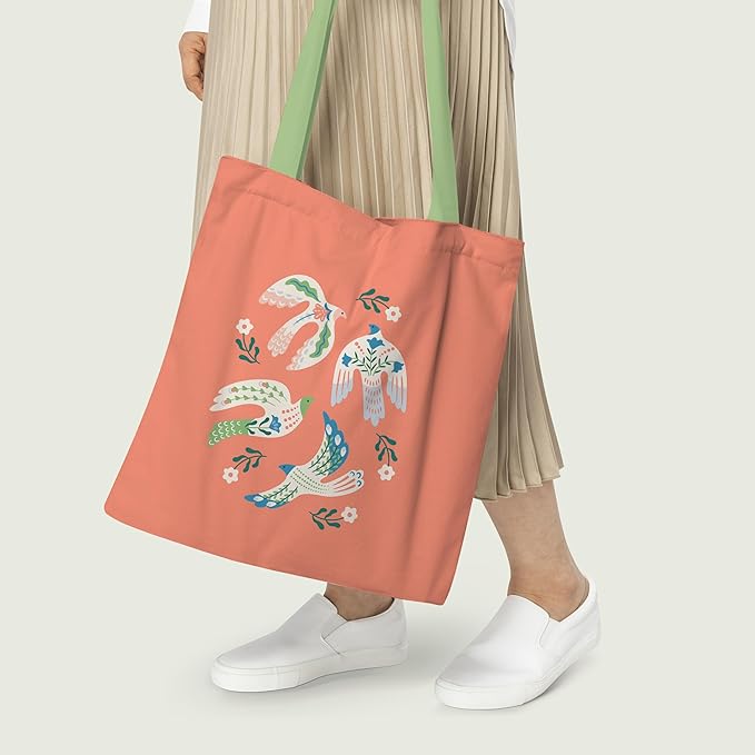 A stylish tote bag adorned with a bright and colorful pattern, ideal for adding flair to any outfit or occasion.