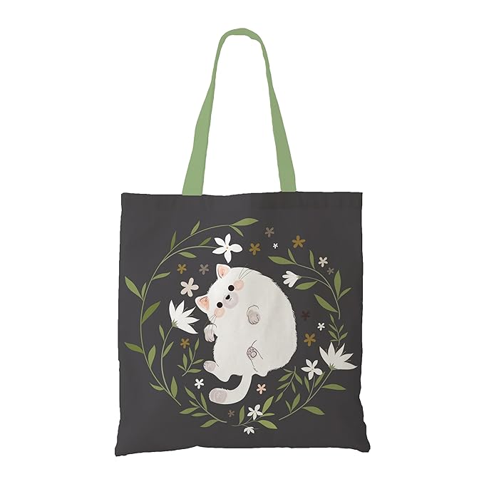 A tote bag featuring a white cat surrounded by colorful flowers, creating a vibrant and cheerful design.
