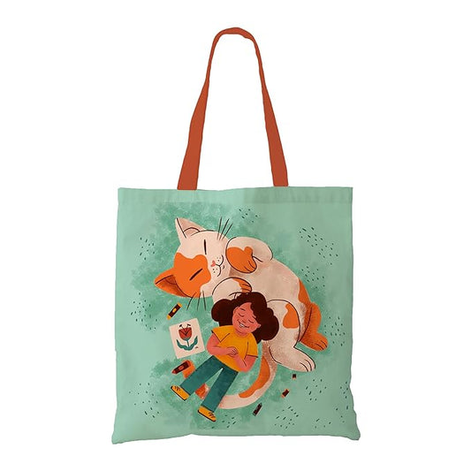 A cute tote bag featuring a girl and her playful cat, perfect for carrying your essentials with style.
