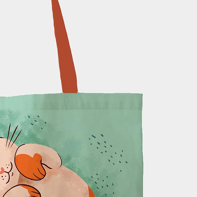 A delightful tote bag displaying a girl and her feline friend, perfect for adding a fun flair to your outings.
