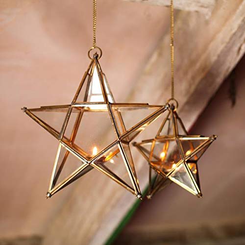  Gold star-shaped light fixture with candle inside, adding warmth and elegance to any room decor.