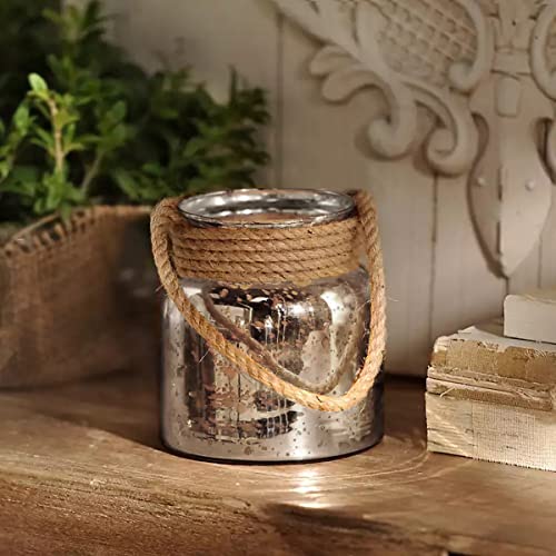  Tabletop display featuring silver jar with rope