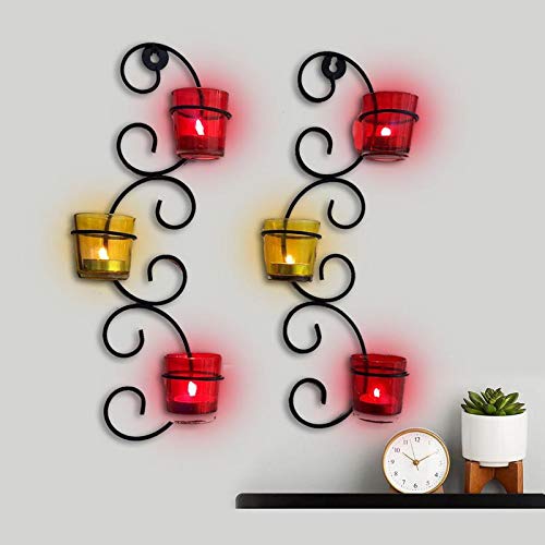  Elegant wall sconce with three candles.