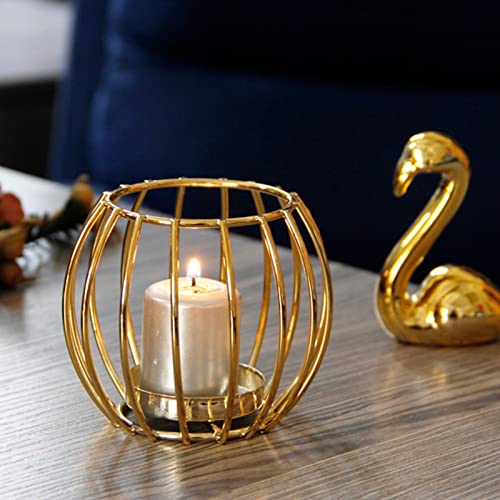  A golden bird cage with a lit candle inside