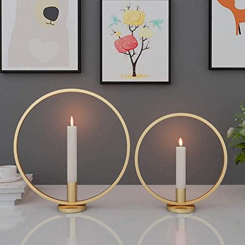Gold candle holders with bear design.
