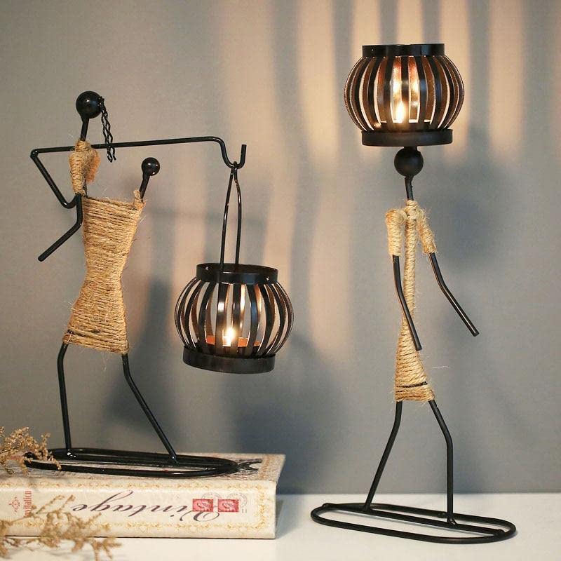  Stylish lamp with metal cage, perfect for modern or industrial interior settings.