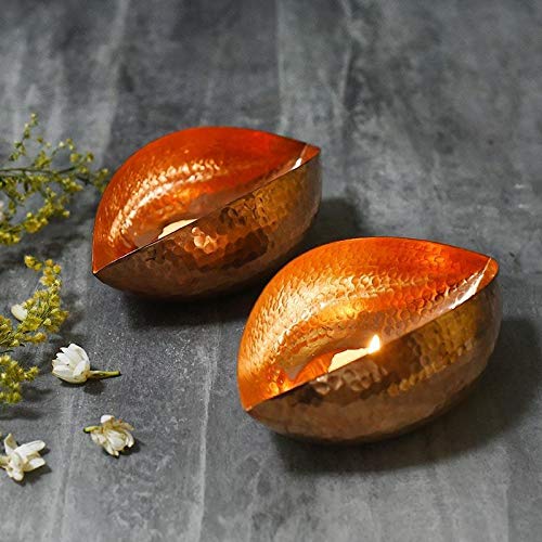 Two copper tea light candles 