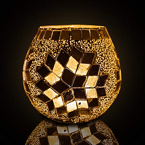 Glass candle holder with gold mosaic design, perfect for adding a touch of elegance to any room.