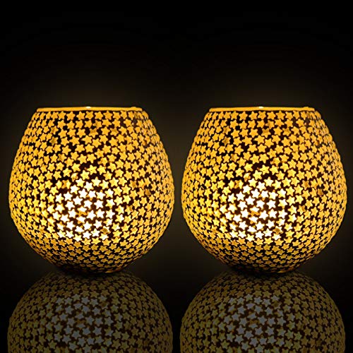  Two yellow glass vases decorated with dotted motifs.