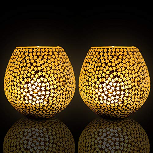  Two yellow vases made of glass, adorned with dots.