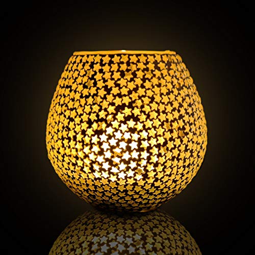 Stylish gold candle holder with star design, perfect for adding a festive touch to your space.