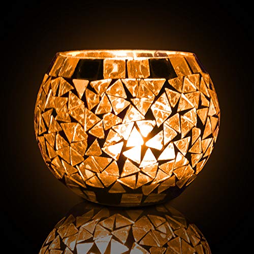  Elegant glass candle holder with shimmering gold mosaic.