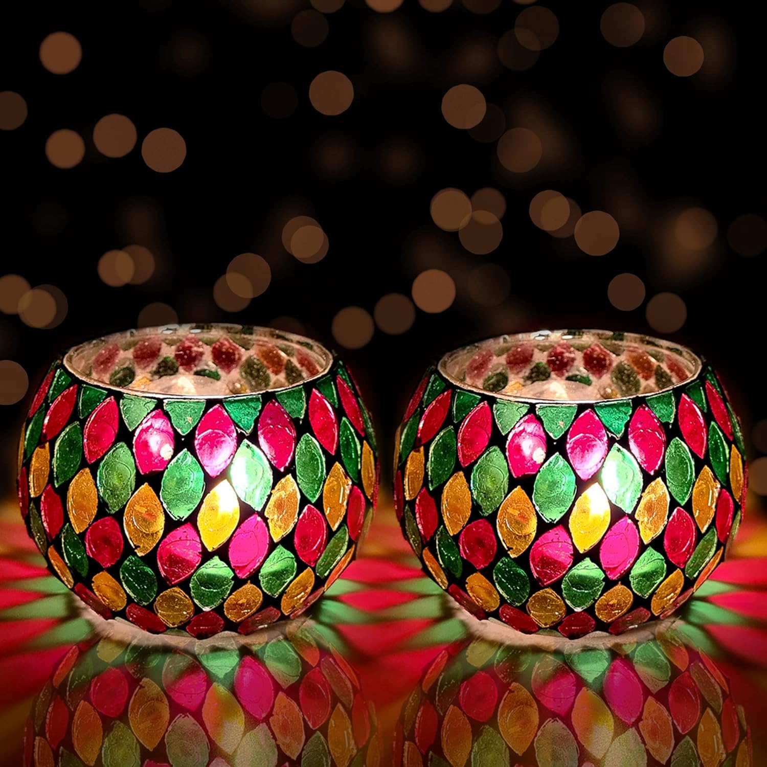 Two colorful glass lamps with gold and green designs.