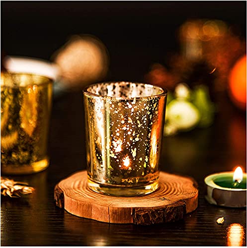  Gold tea light candle holder with intricate design, perfect for adding a touch of elegance to any room.