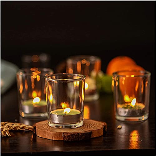 A wooden stand holds four glass votive candles, creating a beautiful and serene ambiance.