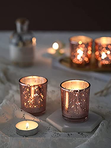 Set of three tea lights adding a soft light to the room.