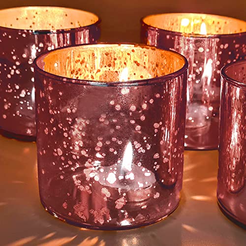 Stylish purple glass votives adorned with shimmering gold accents, adding a touch of glamour to your decor.