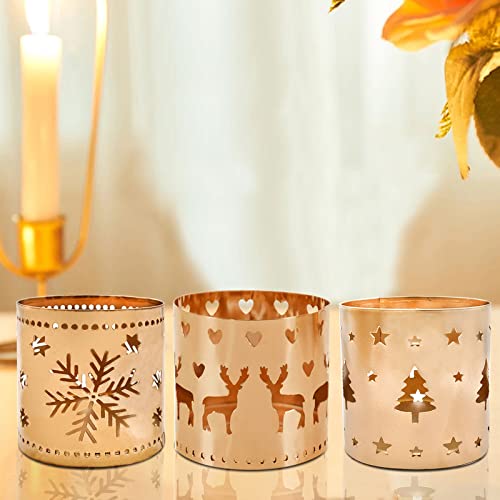 Three gold tea lights with Christmas designs, adding a festive touch to any holiday decor.