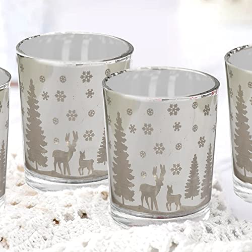 Four glass tumblers featuring deer and trees, perfect for nature lovers.