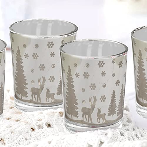 Four glass cups featuring deer and trees designs.