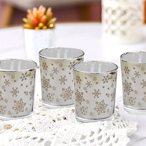 Decorative glass candle embellished with charming snowflakes.