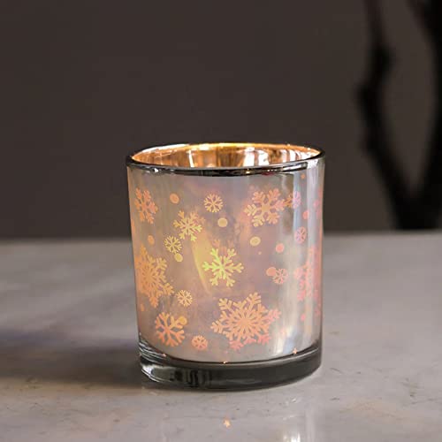 Decorative glass candle embellished with charming snowflakes.