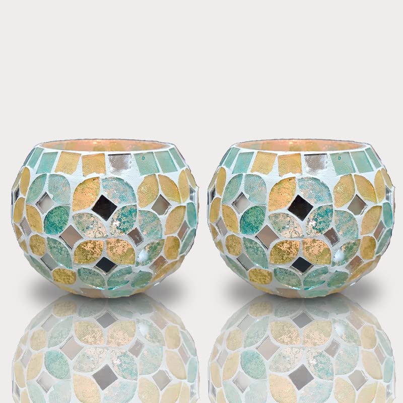 Two glass tealight holders with mosaic designs.