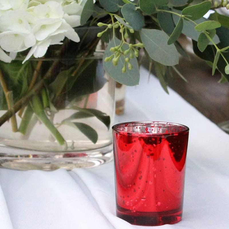 Bright red votive candle with flame.