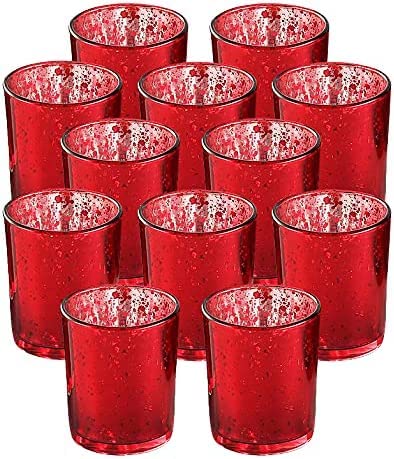 Collection of elegant red glass votive candle holders.