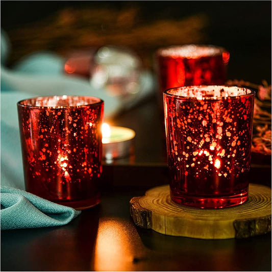 Wooden table with red tea lights.