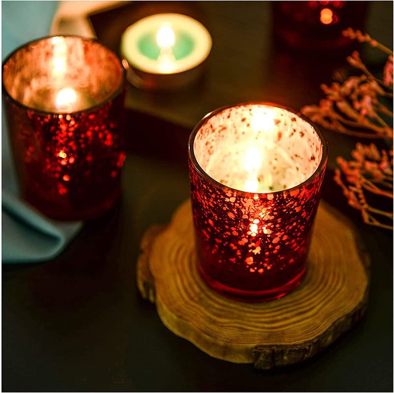 Collection of elegant red glass votive candle holders.