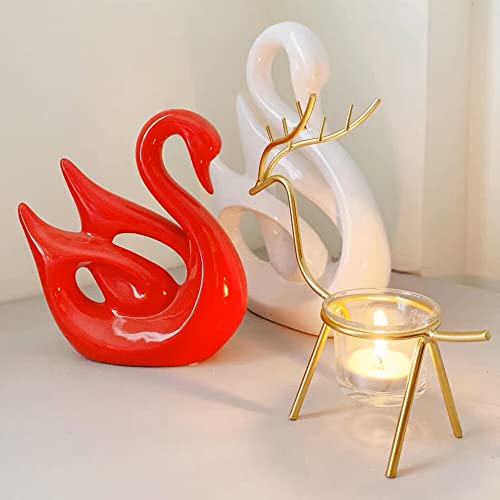 Decorative gold reindeer candle holder centerpiece.