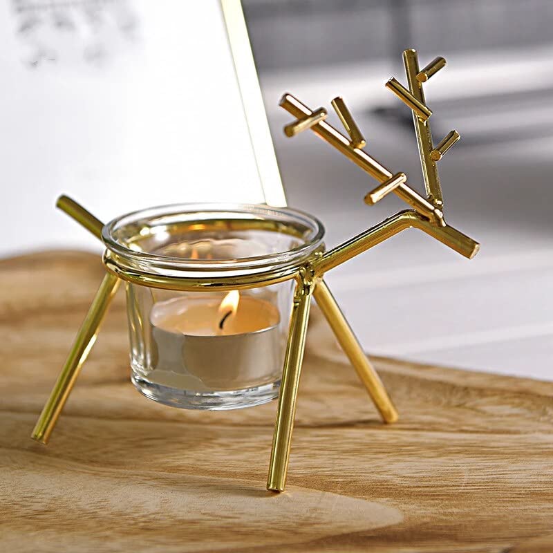 Gold reindeer candle holder featuring a candle, a beautiful and festive centerpiece for your table.