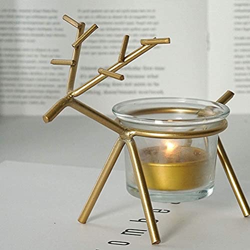 A golden reindeer candle holder with a lit candle, adding warmth and charm to any festive setting.