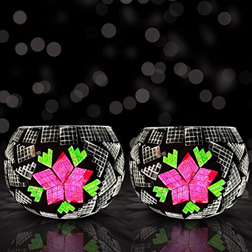 Two glass bowls with pink and green designs, one with floral patterns and the other with geometric shapes.