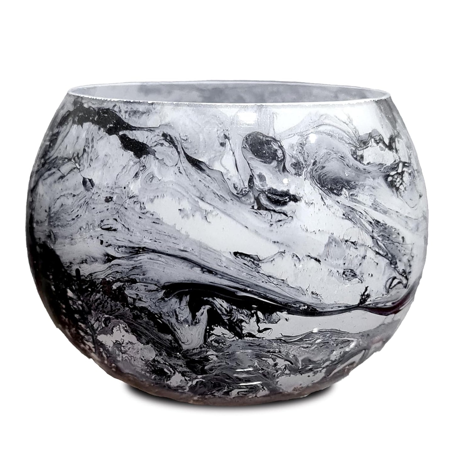 A black and white marble bowl with a unique pattern.