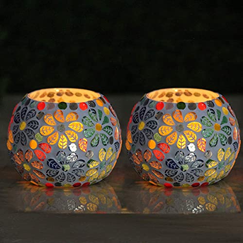 Colorful ceramic tealights adorned with floral design