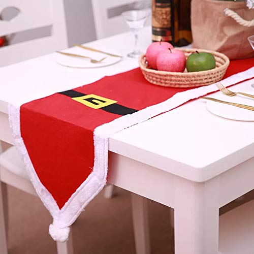 A Christmas-themed red Santa hat on a table.