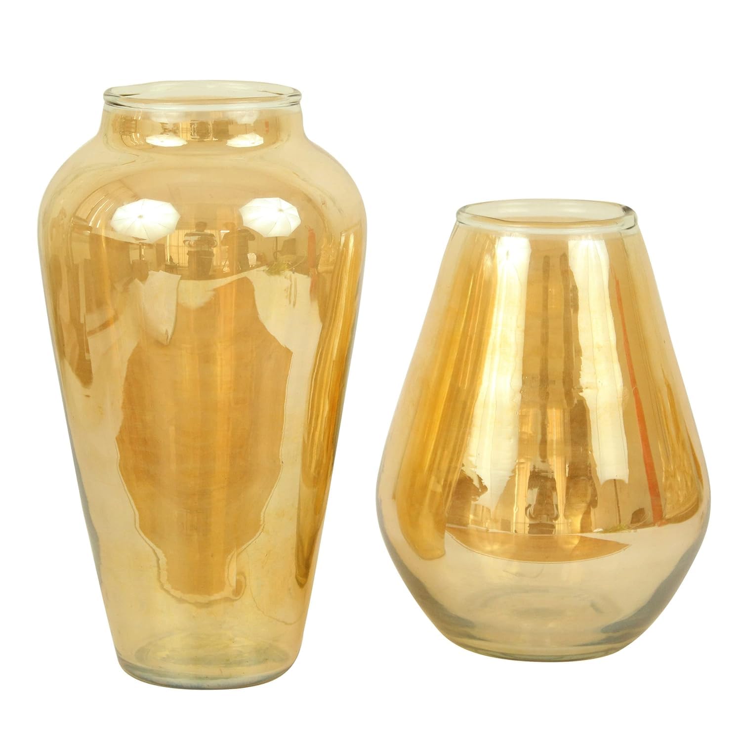 Two golden vases placed side by side, showcasing their intricate designs and gleaming surfaces.