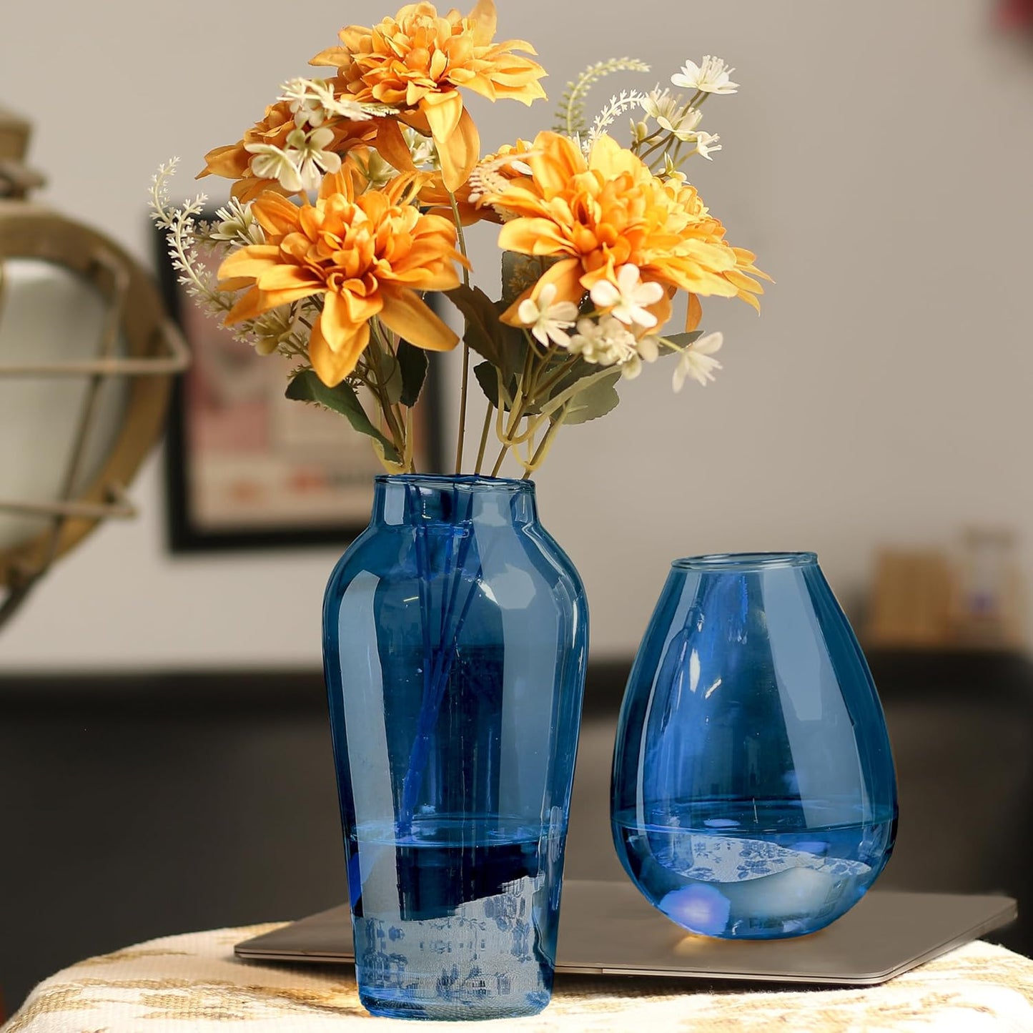 Elegant blue vase sitting on a table, enhancing the room's decor