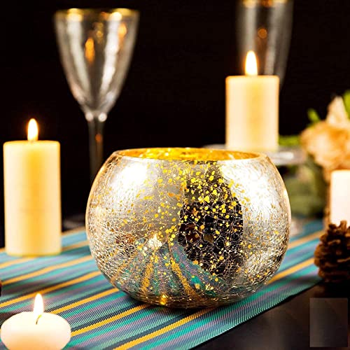 A table adorned with candles and a vase, creating an elegant and inviting ambiance.